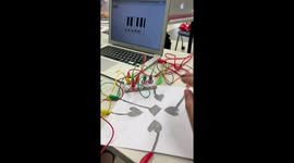 Student connects paper piano keys to computer to make sound