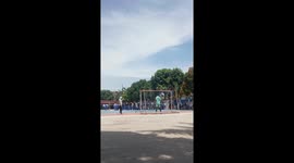 Spectator hit by a ball during football game in Belitang, South Sumatra, Indonesia