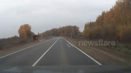 Dashcam captures blue car flipping and crashing in Goloventsino, Vladimir Oblast, Russia