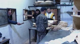 Syria: Damascus residents rush to buy flatbread as bakeries reopen, ration limits raise