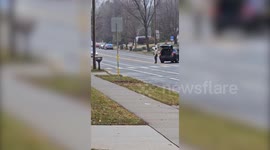 Emergency crews line the street in front of Abundant Life Christian School after shooting
