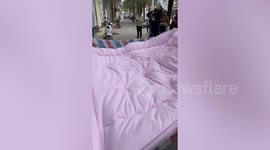 Hero saves boy dangling from tower block by shirt