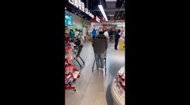 Supermarket visitor falls while trying to glide on shopping cart