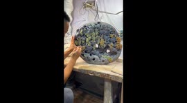Traditional stone carving thrives in China with stunning grape artworks