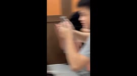 Wild monkey breaks into class and snatches food from student at university in Taiwan