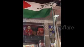 Pro-Palestine activists staged a sit-in in front of AXA