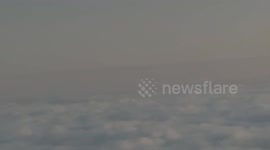 Light orbs spotted in the sky during Chicago to Newark flight, USA
