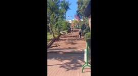 Cyclist crashes into trash bin after stair descent in Beijing, China
