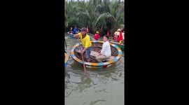 Tourists spin round on coconut boats in Vietnam