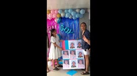 Couple uses their pictures for tic-tac-toe gender reveal