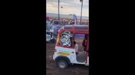 Formula Tuk Tuk! Three wheelers race on dirt track in Cambodia