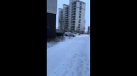 Snow blower clears car effortlessly in China