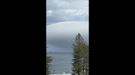There's a spaceship inside! Eerie UFO cloud stuns residents in Australia