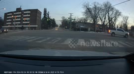 Close Call: Grey Vehicle Runs Red Light and Almost Hits Another Oncoming Car