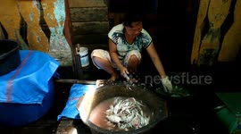 Workers process salted fish at Kertapati district in Palembang, Indonesia on December 19, 2024. The export value of Indonesian fishery products until September 2024 reached USD 4.23 billion with a total export volume of 1.02 million tons. This export valu