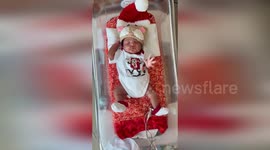 Newborn 'Christmas babies' shown off at clinic in Cleveland