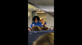Flight Attendant Sings Plane Instructions To Ice Ice Baby Tune