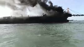 Philippine Coast Guard tackles cargo ship fire in Manila Bay