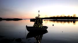 Christmas Boat in Marblehead, Massachusetts lighting up the early morning