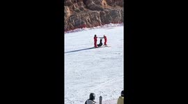 Skiing redefined: Chinese skiers create abstract trio pose on snow