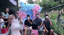 Family have bizarre gender reveal game involving licking nappies