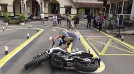 Beginner motorcyclist falls during training event in Indonesia
