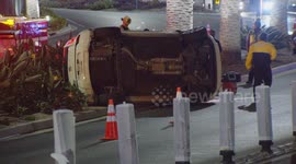 US, Los Angeles: Universal City Driver Flips Car At Universal Studios Entrance