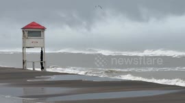A lifeguard tower closed for the winter and very rough seas on the coast of Lido di Ostia in Rome.