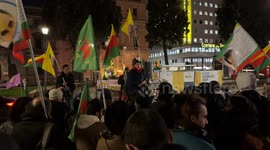 A man talks to the demonstrators during the demonstration called by the Kurdistan Italia Information Office with the slogan 'Defend Rojava' in Rome.