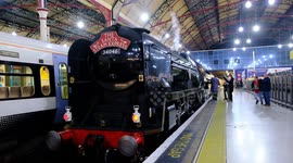 Charming Santa Steam Express creates magical festive journey for passengers at London's Victoria Station