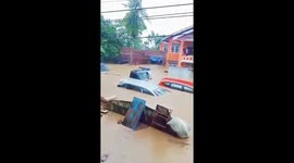 Cars submerged by monsoon floods in Indonesia