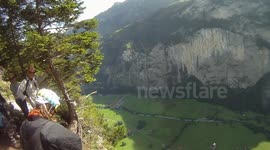 Wingsuit base jump air to air filming