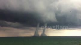 Rare double water spout caught on camera in Lake Michigan