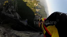 Wingsuit Proximity flying in China hand cam angle