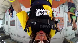 Base jumping aerobatic barrel rolls from KL Tower, Malaysia