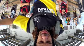 Base jump gainer from KL Tower building self portrait camera