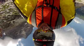 Amazing wingsuit base jump proximity flying with Douggs self portrait camera