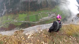 Douggs filming his wife Jenny on her 1st BASE jump at this cliff in Lauterbrunnen