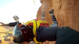 Cliff Base jump Douggs Hand camera angle Moab, Utah