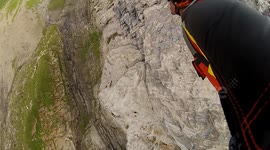 Wingsuit proximity flying BASE jump Douggs hand camera angle