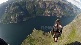 Big wall BASE jump double gainer with Douggs filming in Norway