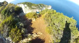 Amazing Base jump from Secret Cove cliff in Greece Douggs POV angle and bottom Camera angle