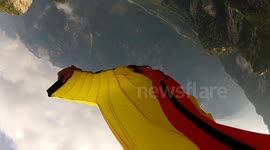 Wingsuit proximity BASE jump with Douggs leg mounted camera