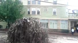 Manhole bursts and leaks out flood-water in Manitou Springs