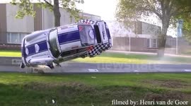 Porsche flips during rally and lands in canal