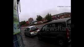Woman knocked down by motorcycle and robbed