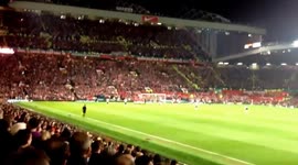 Liverpool fans throw flare at utd fans