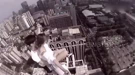 Two couples take selfies on rooftop