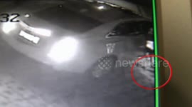 Woman getting off car drops into uncovered well