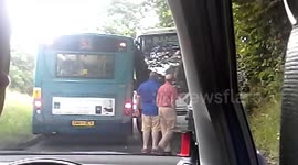 2 Buses Get Stuck on Narrow Road
